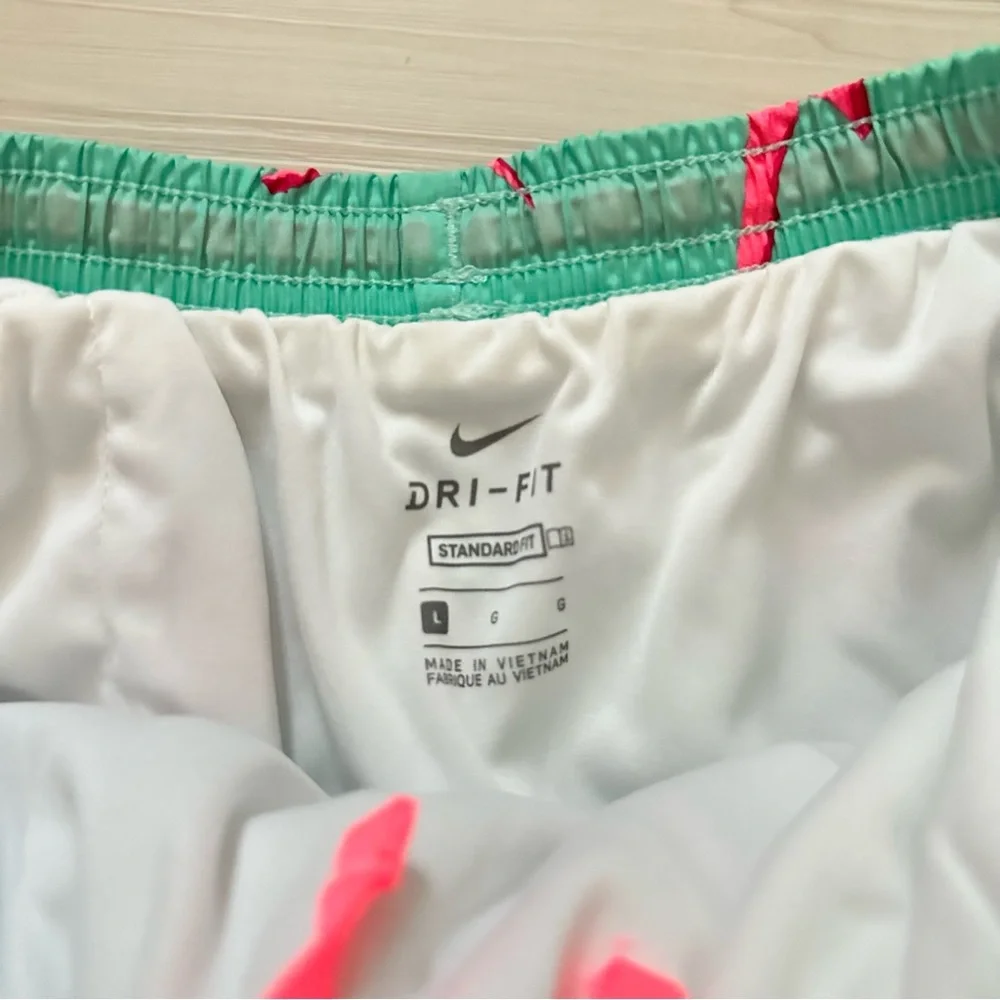 NWOT Nike Green and Pink Lined Athletic Shorts Lightweight Dolphin Hem